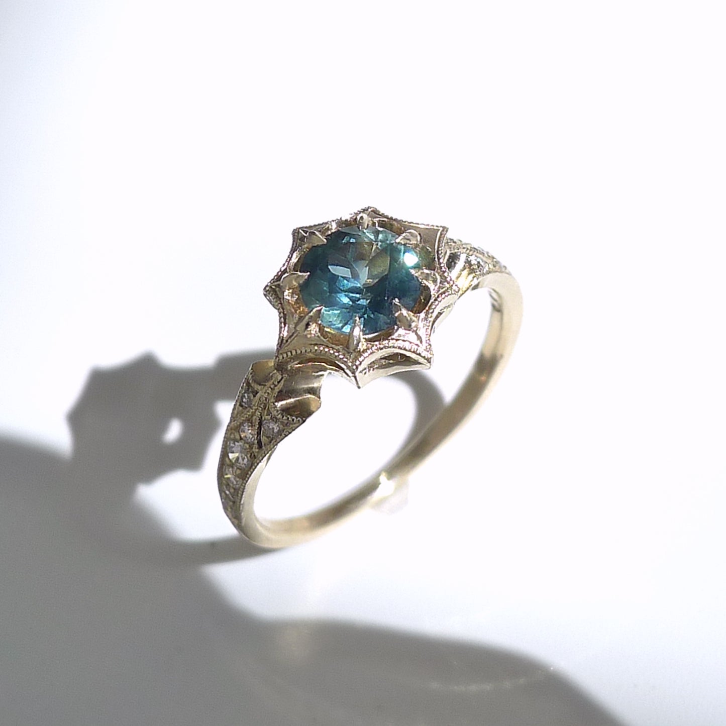 Dione Ring With Blue Green Sapphire
