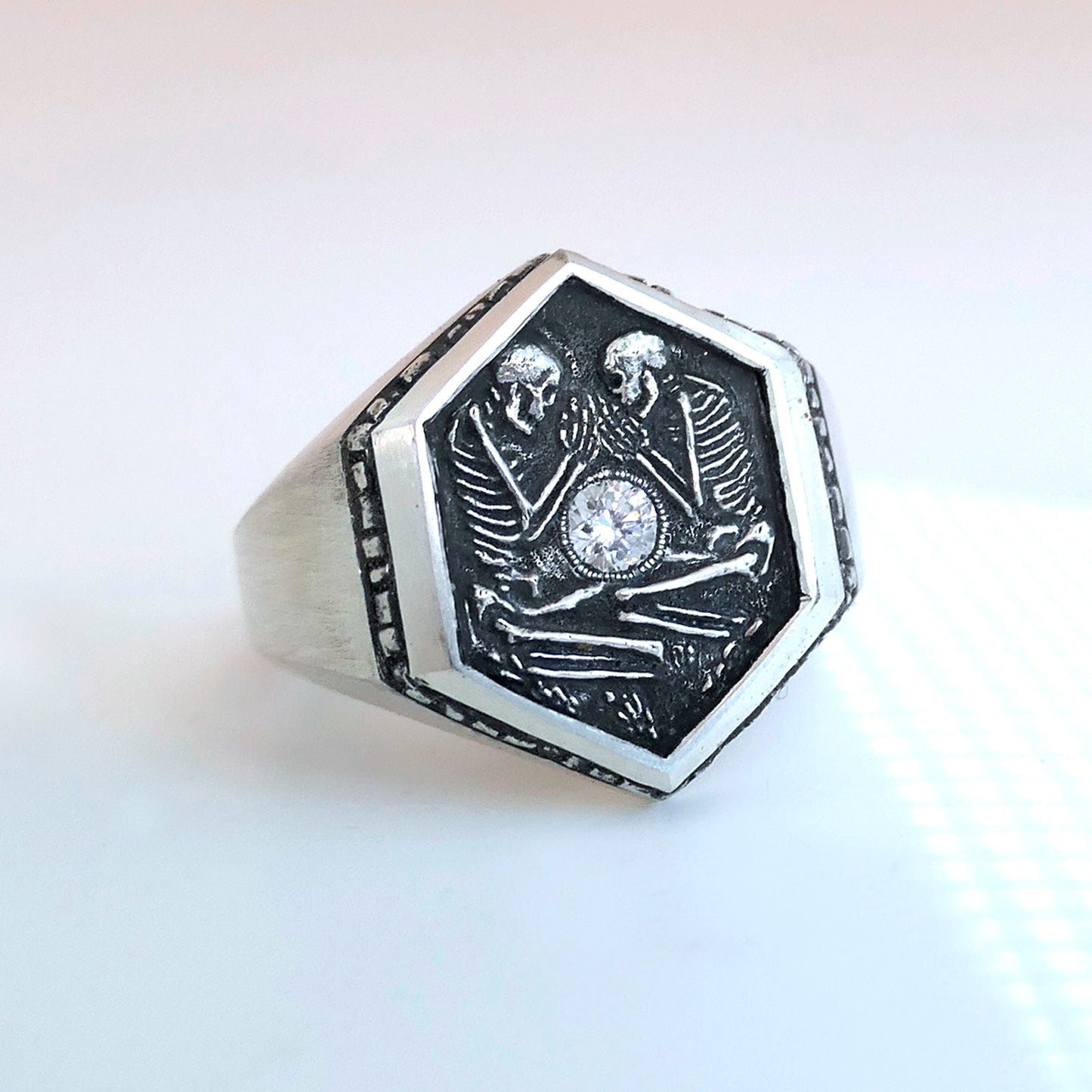 Shallow Grave Ring With Two Skeletons