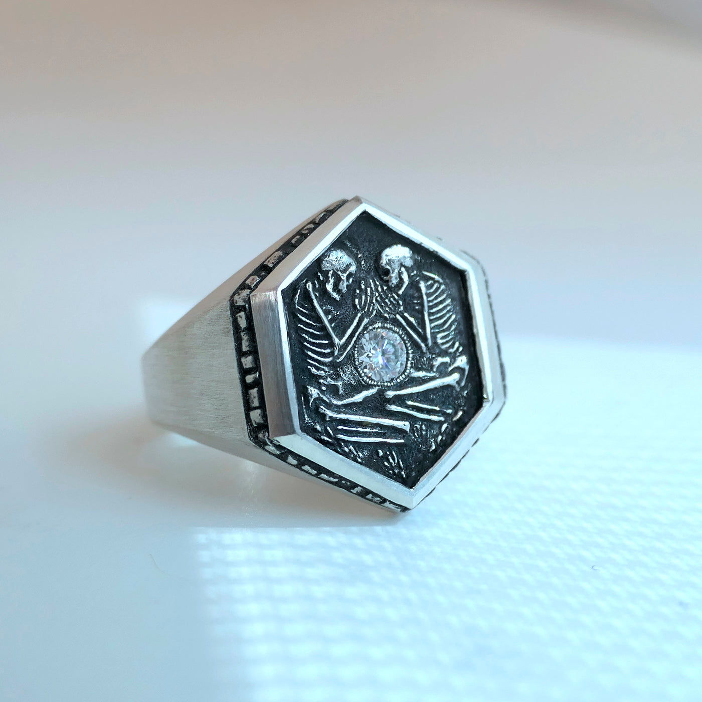 Shallow Grave Ring With Two Skeletons