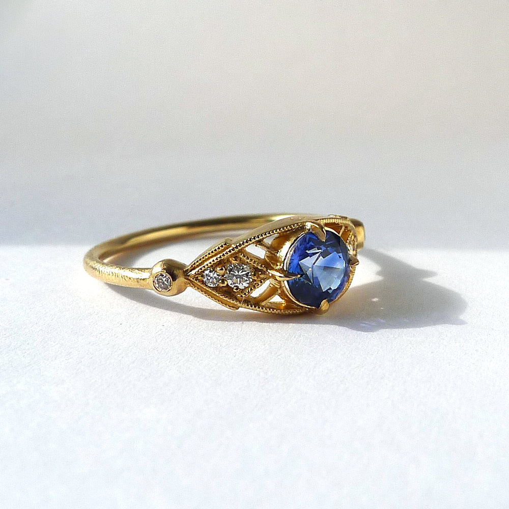 
            
                Load image into Gallery viewer, Isadora Ring w/ 5mm Medium Blue Sapphire
            
        